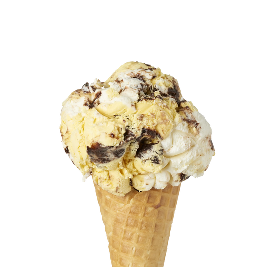 Single scoop of Banana Boat Kawartha Ice cream flavour in a waffle cone on a white background.