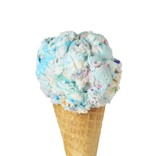 Single Scoop of Birthday Cake Ice Cream flavour in a waffle cone on a white background