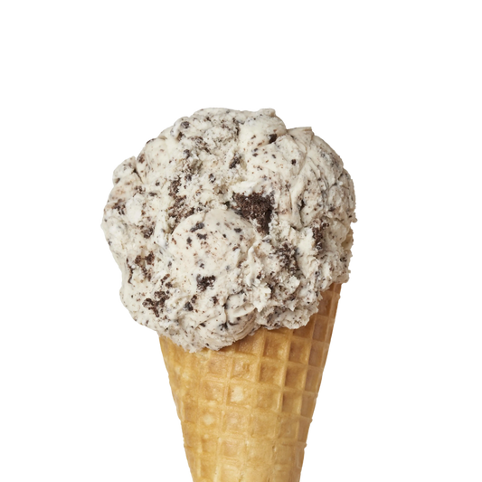 Ice cream cone with cookies and cream flavour ice cream on a white background