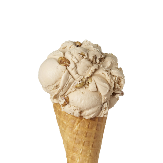 Ice cream cone with vanilla maple ice cream and walnuts on a white background