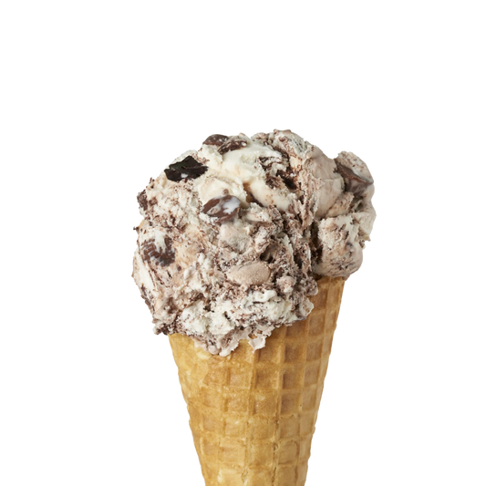 Ice cream cone with Kawartha Dairy signature Moose Tracks chocolate chunks ice cream on a white background