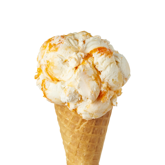 Ice cream cone with vanilla ice cream and orange pineapple swirls on a white background