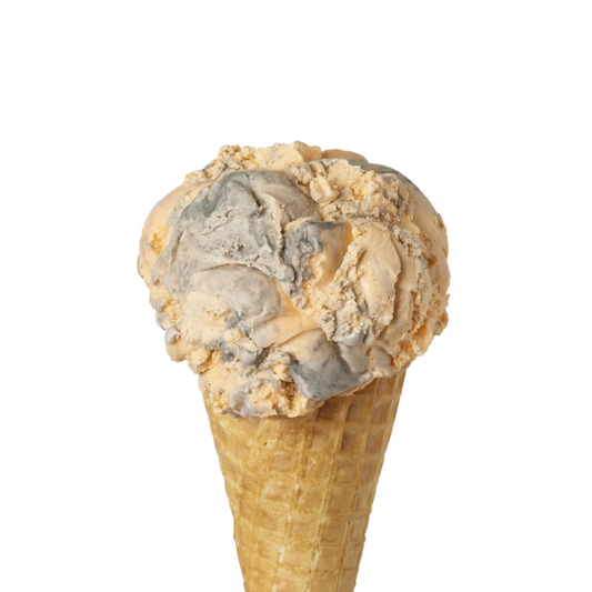 Ice cream cone with two scoops of tiger tail flavour ice cream on a white background